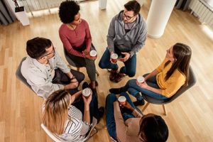 a diverse group gets peer support in heroin addiction treatment 