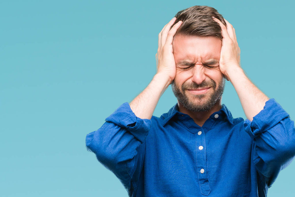 a man struggles with his mental health and anxiety attacks due to anxiety and stress