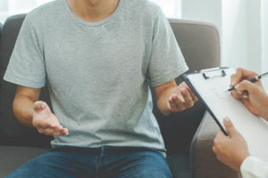 a man opens up in a ptsd treatment program in the hopes of healing past trauma 