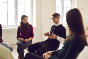 a therapy group meets in an intensive outpatient program in columbus