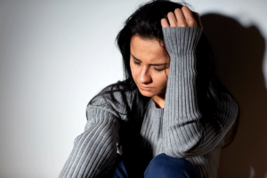 a woman struggles with the long term effects of heroin use