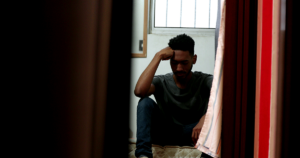 a man struggles to conceal his opioid addiction