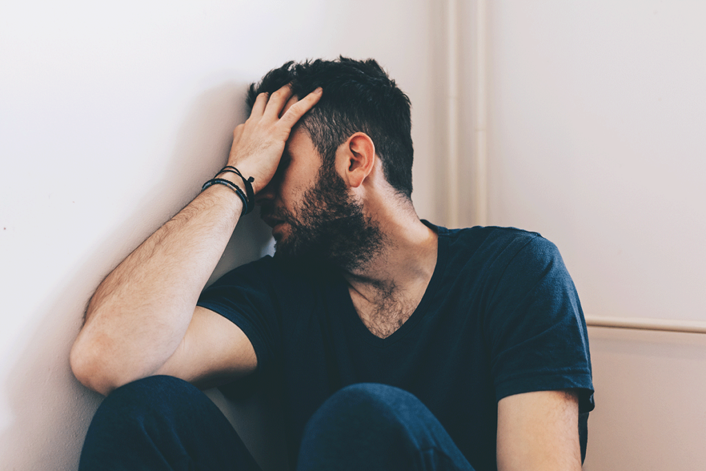 a man struggles with the symptoms of a potential cocaine overdose