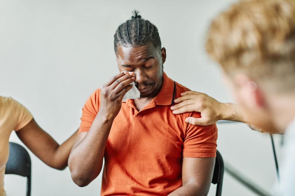 a man opens up in therapy about the effects of his childhood trauma