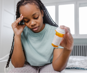 a woman takes suboxone for opioid addiction