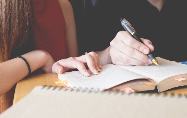 two individuals study the dangers of ecstasy