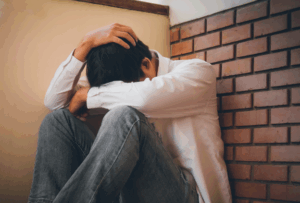 an individual struggles with unpleasant trazodone side effects